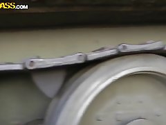 Great looking chick in mini skirt and black stockings is getting fucked in a public place