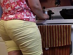 Big ass woman is slowly taking off her clothes and teasing a guy she wants to fuck