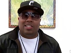 Horny black guy is fucking a red haired woman and fingering her ass at the same time