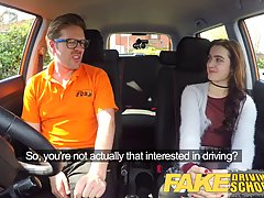Instead of having a driving class, naughty teen brunette is getting fucked in the car