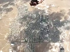 Naughty babe went skydiving while she was wearing no shirt and bra, just for fun