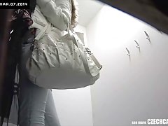 A dirty voyeur is making a video, while a hot girl is trying out her new nightie