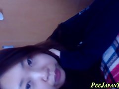 Japanese babe is often peeing in the bath tub and making a video of it