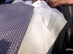 Blonde girl is giving pleasure to her partner in the nature, in the middle of the day