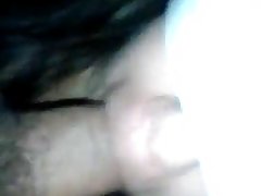 Slutty woman is eagerly sucking a rock hard dick while her partner is making a video