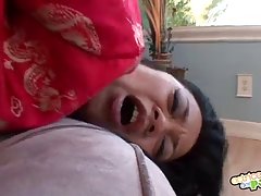 Asian beauty in red, satin outfit, Lucky Star is sucking dicks for a lot of money