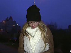 Blonde babe knows how to warm up on a cold, winter day, in a public place