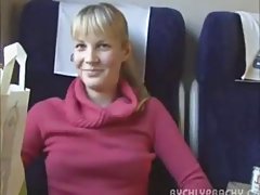 Lovely blonde in pink sweater is about to suck a stranger's dick in the train